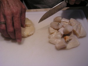 cutting up conch for processing
